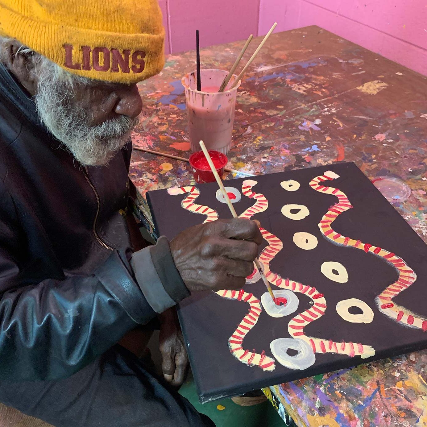 Mantamaru Artist Painting in Gallery